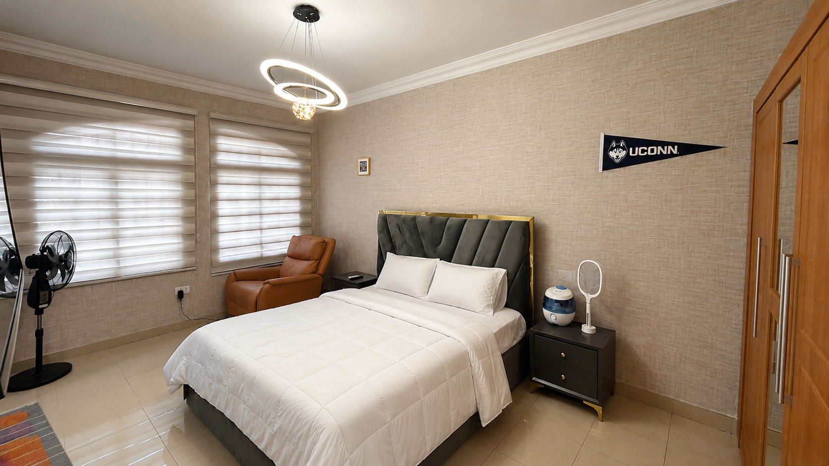Gold 7 Residence master bedroom with white bedding