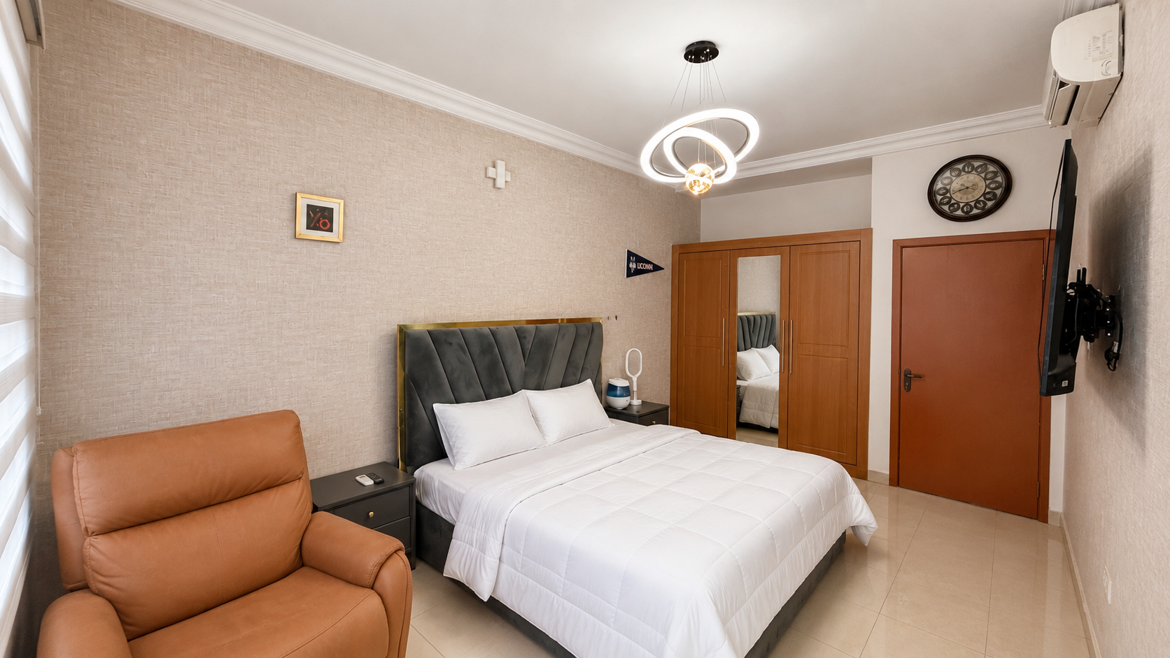 Gold 7 Residence master bedroom with wardrobe and television